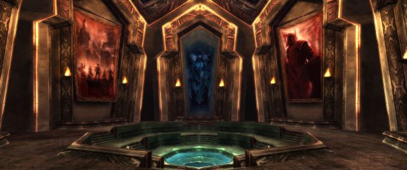 Innenbereich der Halle der Monumente mit orangefarben leuchtenden Wänden, großen Bannern und einer runden zentralen Plattform.